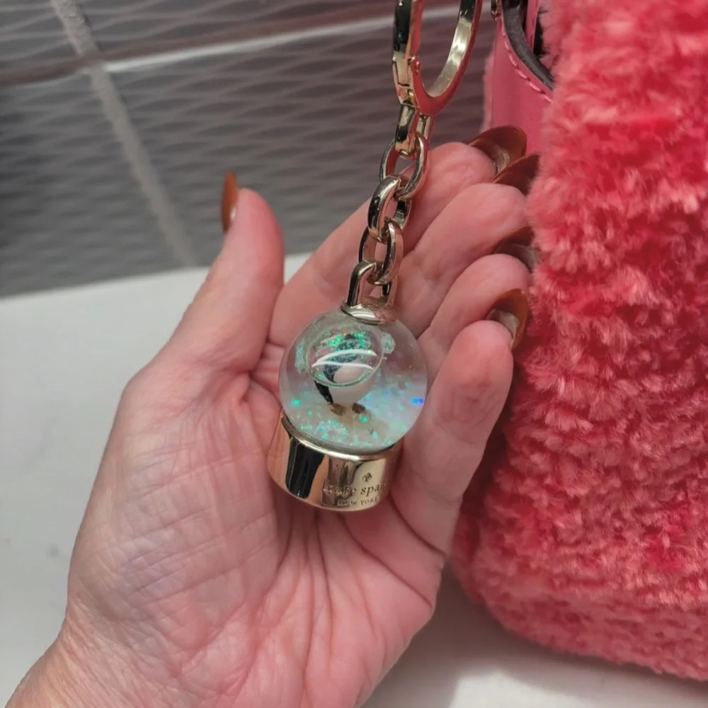 KATE SPADE Pink Faux Fur Bag with Leather Trim and Penguin Snow globe Charm